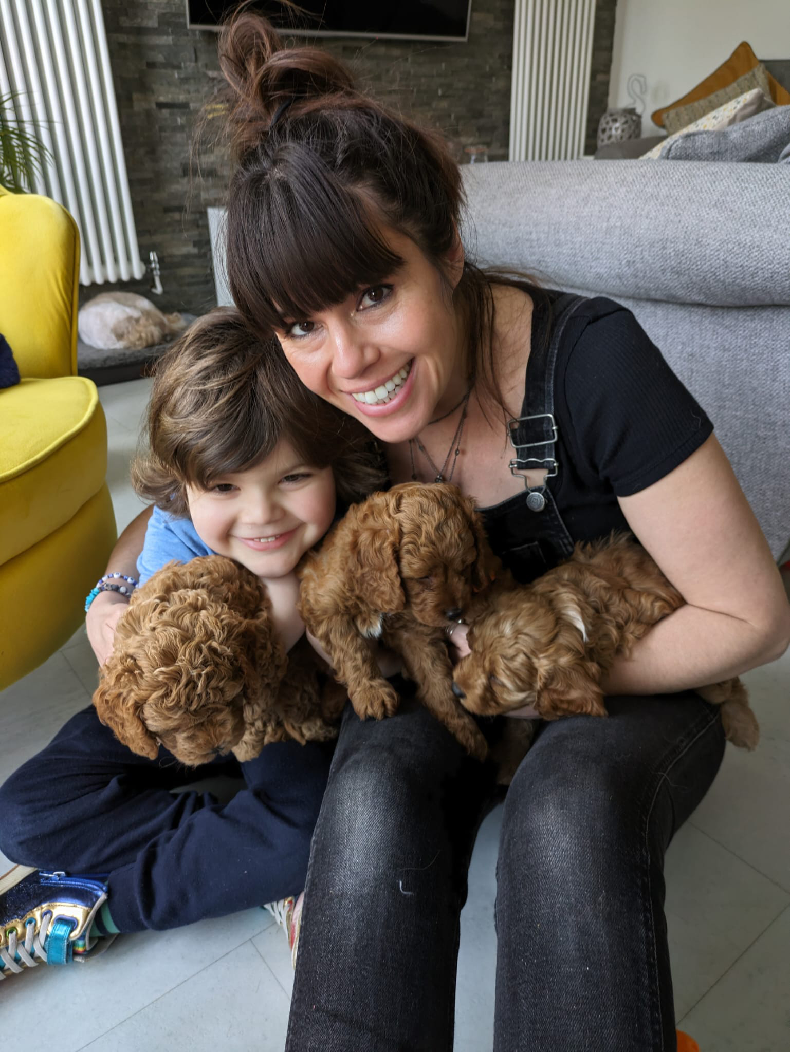 Hannah and Bodhi with three puppies